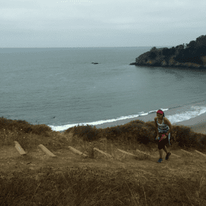 Shaheen Kabir hiking on a seaside trail