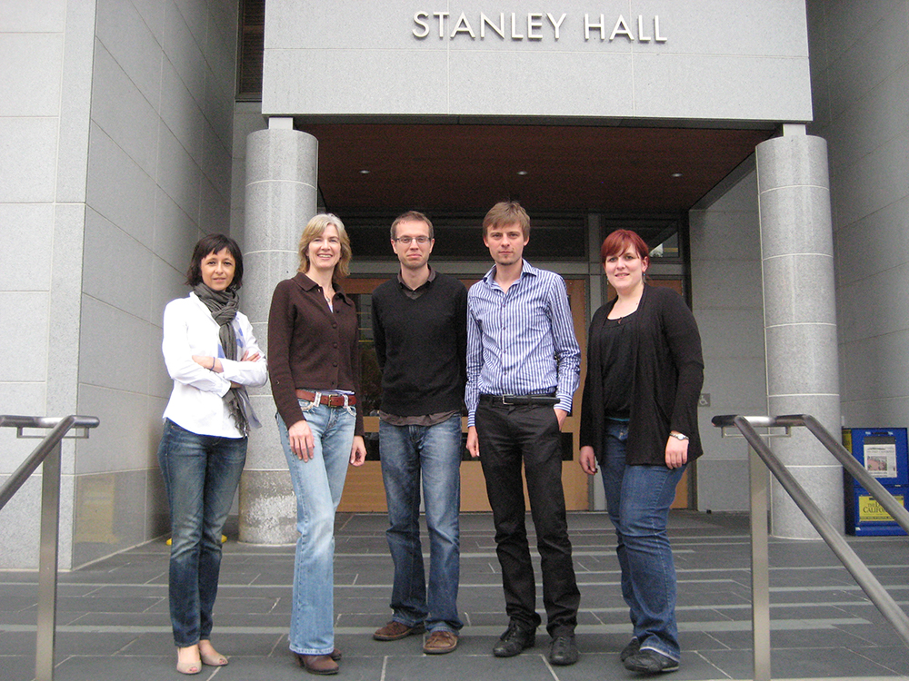 A photo from 2012 in front of Stanley Hall on the UC Berkeley campus that captures five of the six original authors of the Science paper that first described CRISPR genome editing: Emmanuelle Charpentier, Jennifer Doudna, Martin Jinek, Krzysztof Chylinski, and Ines Fonfara (left to right); not pictured: Michael Hauer.
