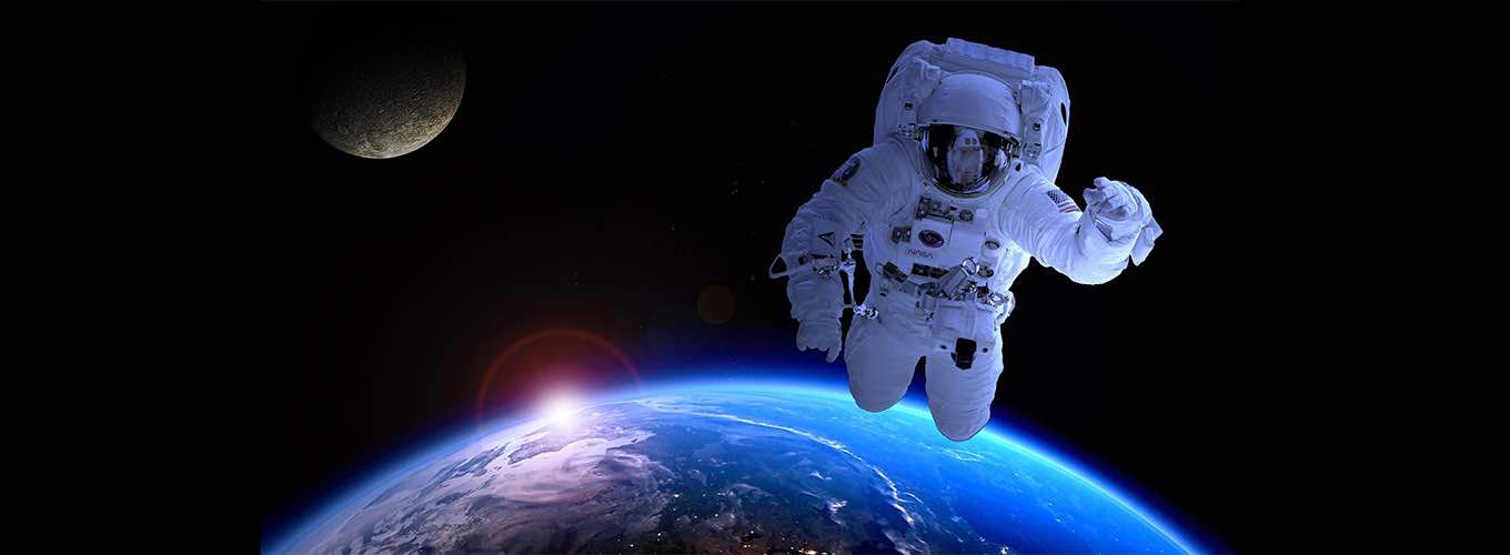 Astronaut Floating in Space Above Earth