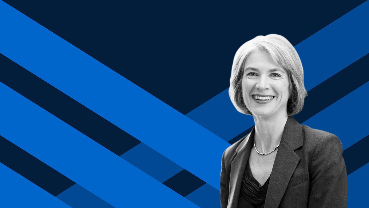 Jennifer Doudna against blue pattern background