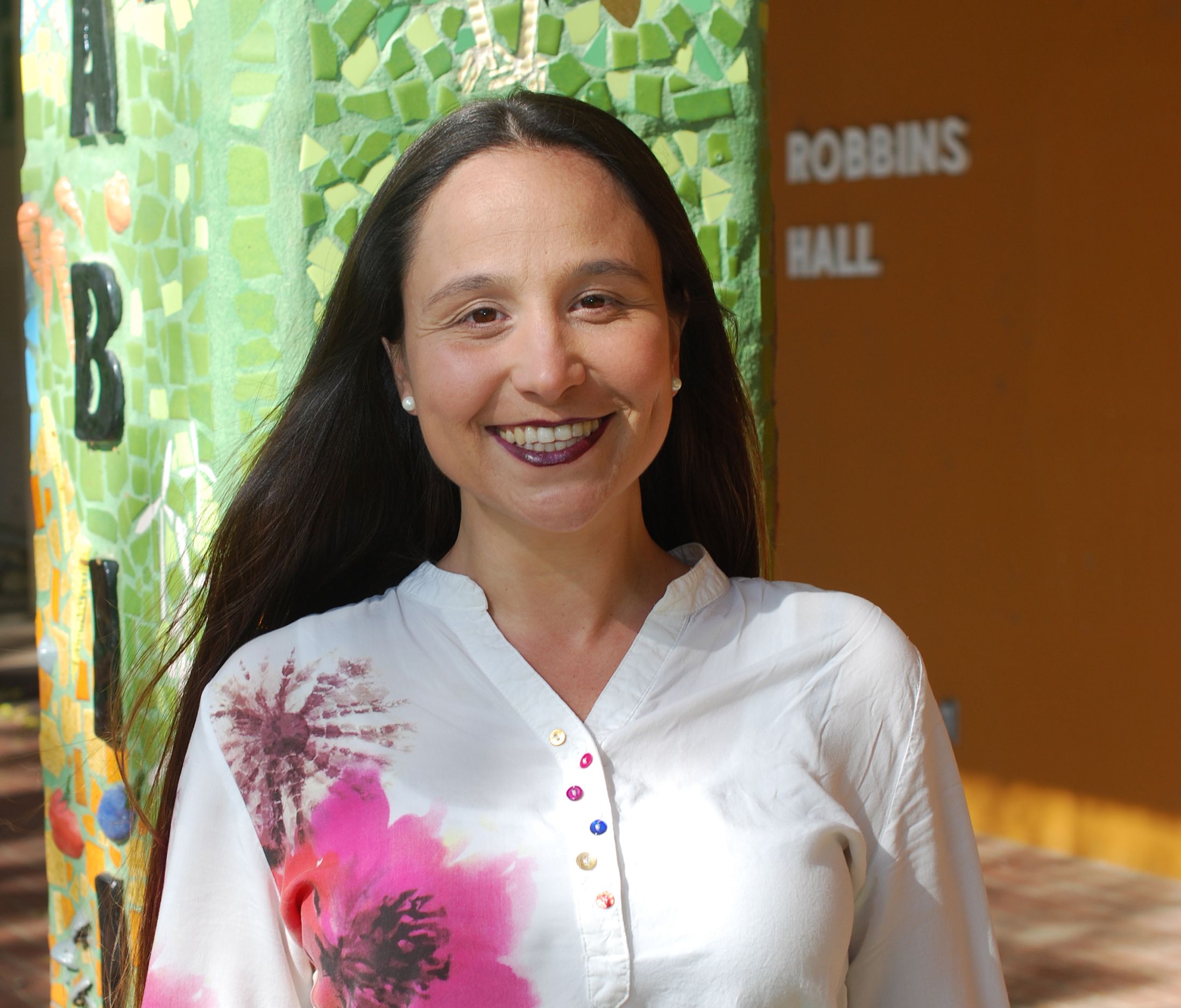 María Florencia Ercoli in a white button-down shirt