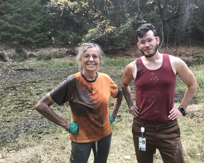 Basem Al-Shayeb and Jill Banfield in the field, looking muddy