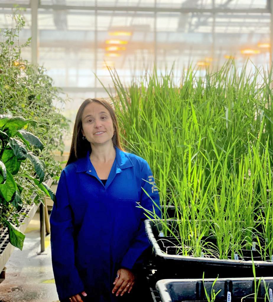 María Florencia Ercoli in a greenhouse at UC Davis