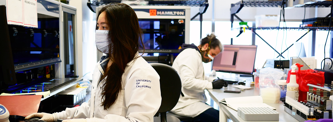 Two scientists working in the Clinical Laboratory at the Innovative Genomics Institute in Berkeley, California