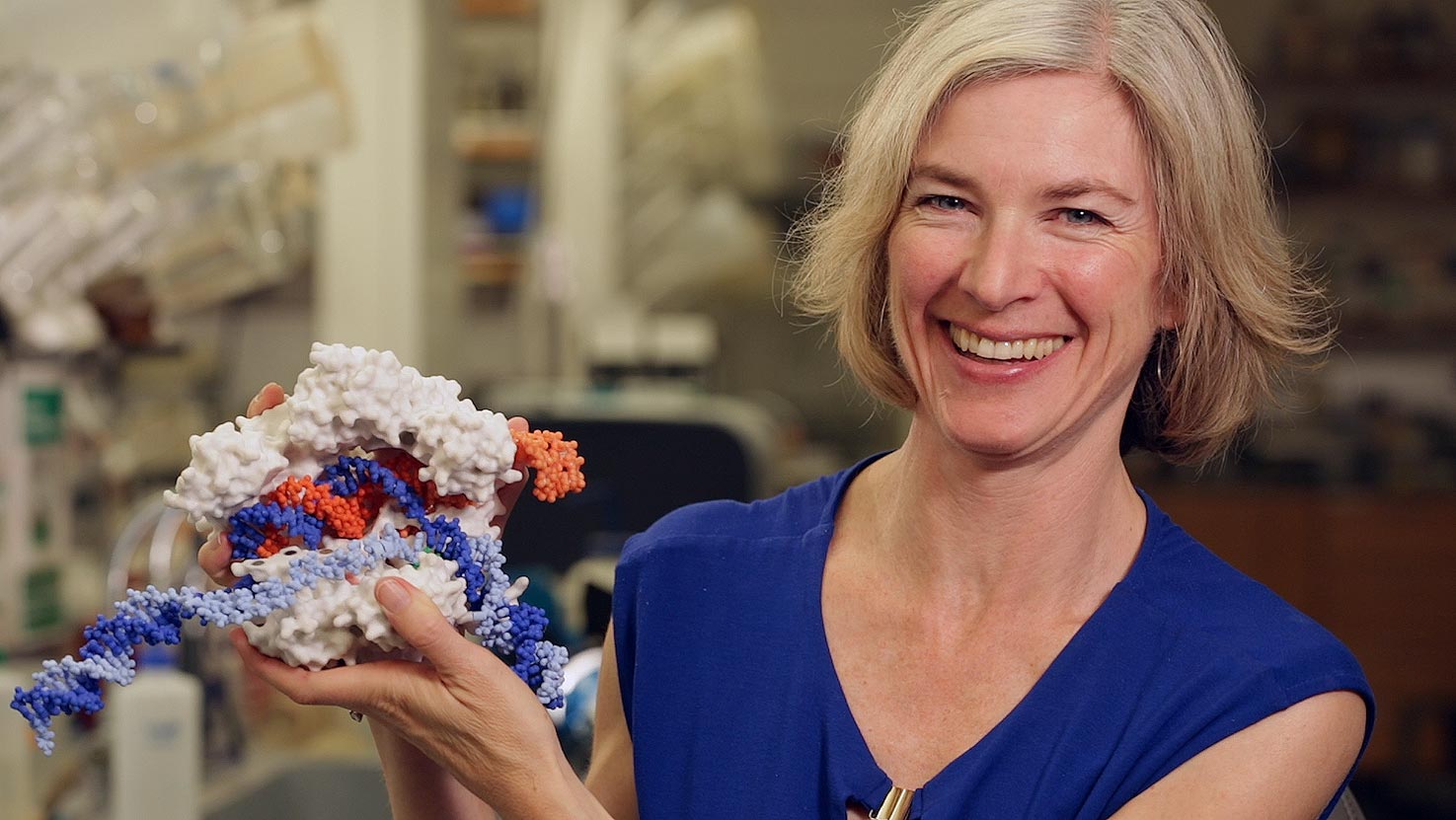 Jennifer Doudna posing with CRISPR model