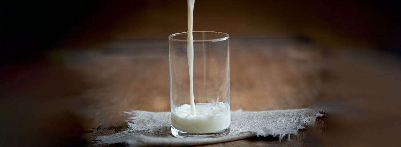 Milk being poured into a glass