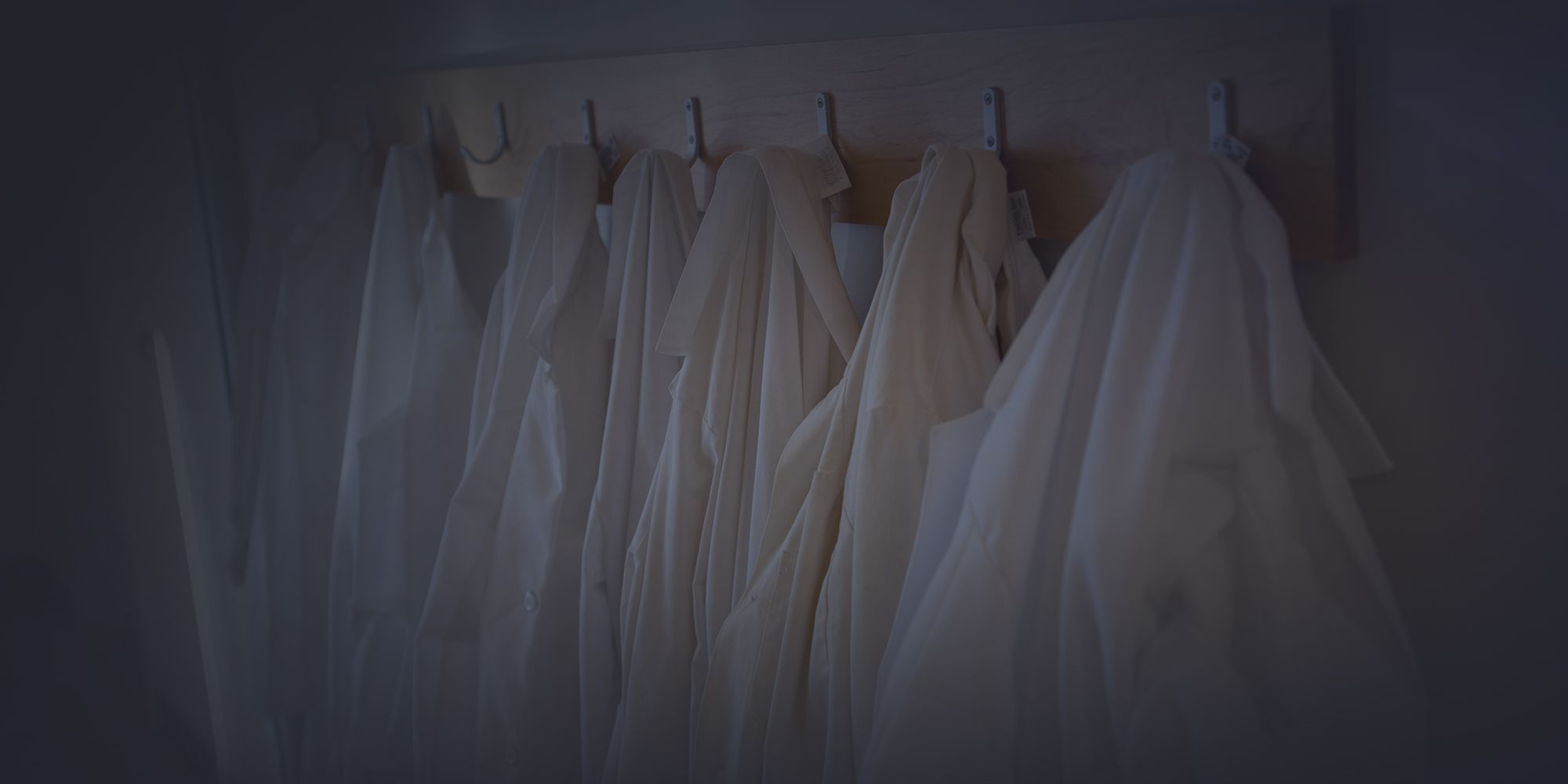 Photo of hanging lab coats