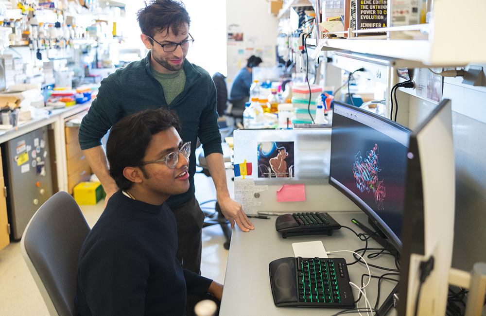 Ron Boger and Seyone Chithrananda working in the Doudna lab at the IGI